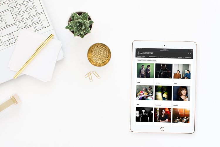 project: WEBSITE VISUAL DESIGN client: AUGUSTINE description: social profiles of artists as seen on tablet